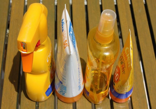 Different bottles and tubes of sunscreen