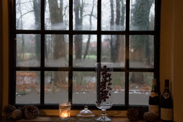 A window with a winter scene outside