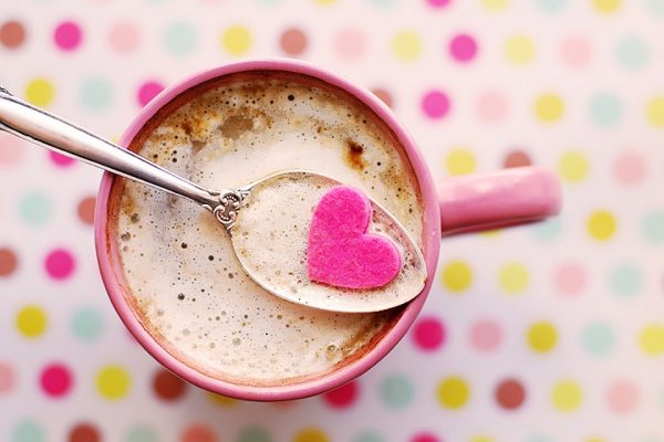 A spoon in a mug of hot chocolate