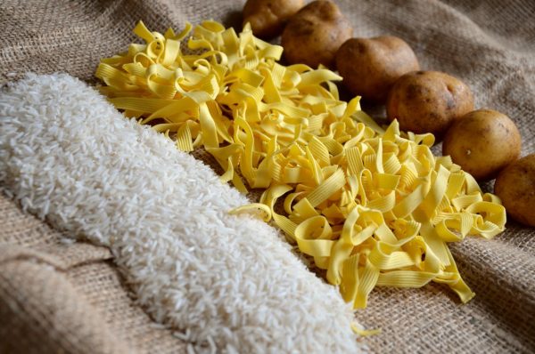 Rice, noodles and potatoes lined up in piles