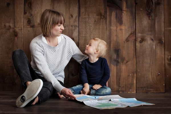 A mother and her son looking at eachother