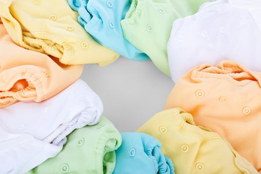 A circle of colourful nappies