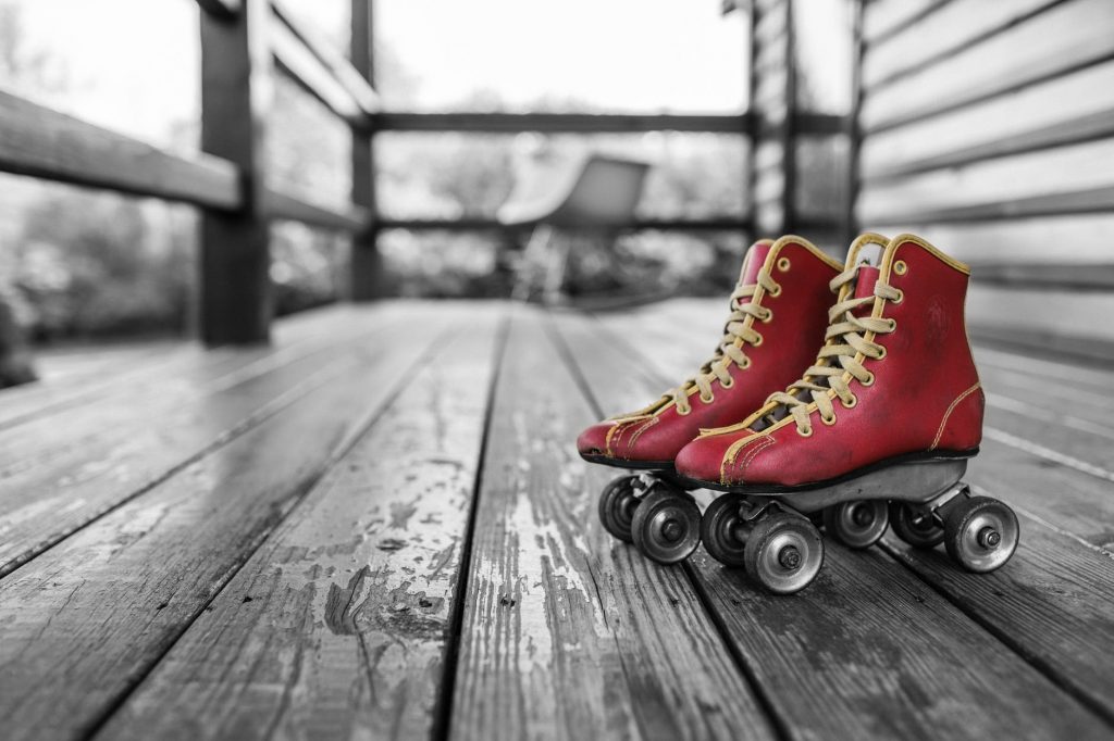 A pair of red roller skates