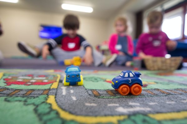 A picture of children playing at nursery to represent Why Join a Schoolhouse Day Nursery