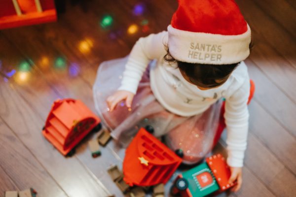 a child playing at christmas