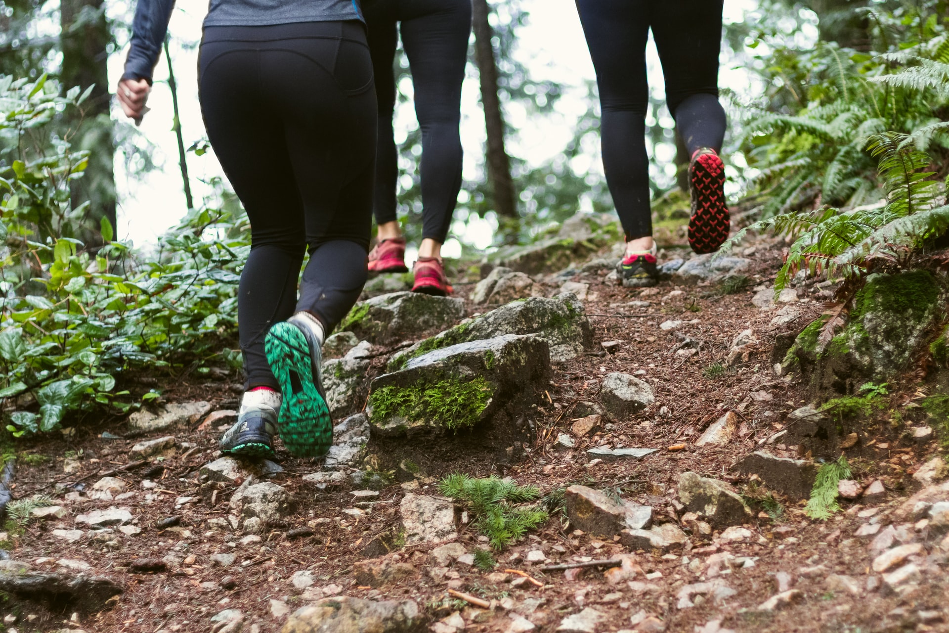 An image of three women hiking to represent the Snowdon challenge