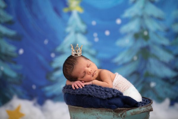 a baby wearing a crown to represent royal baby names