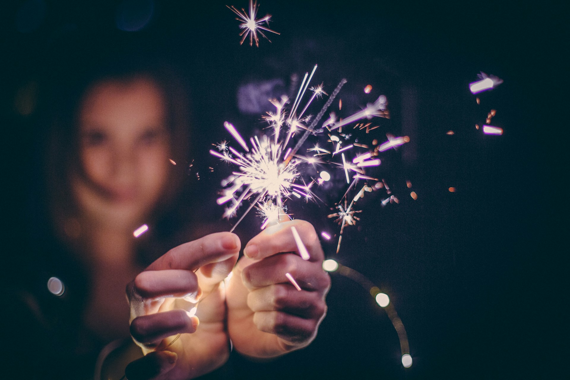 sparklers to represent New Year's Eve with children